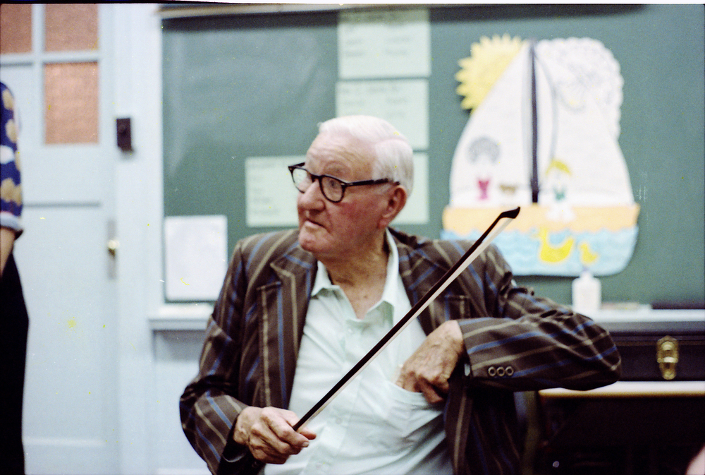 Jarrel playing in a local schoolhouse. Image courtesy Don Mussell.
