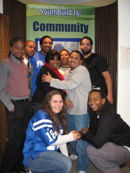 Lanier Spriggs with YouthBuild participants.