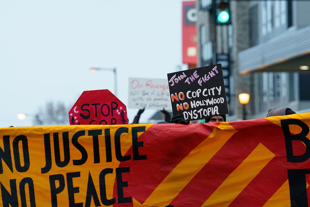 A Stop Cop City protest. A sign reads, "Join the Fight. No Cop City. No Hollywood Dystopia."
Forever, I Love(d) Atlanta