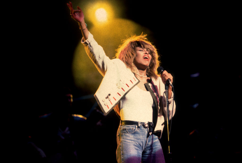 Tina Turner performs onstage at the United Center, October 1, 2000. (Photo by Paul Natkin/Getty Images) How Tina Turner's abuse and trauma remains a hip-hop trope.