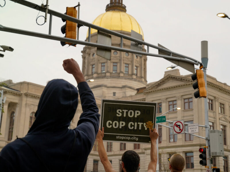 GSU Cop City student demands: Protesters gathered outside of the Georgia State Capitol in Atlanta in protest of Cop City as the clear cutting of trees began on March 31, 2023. REUTERS/Cheney Orr.