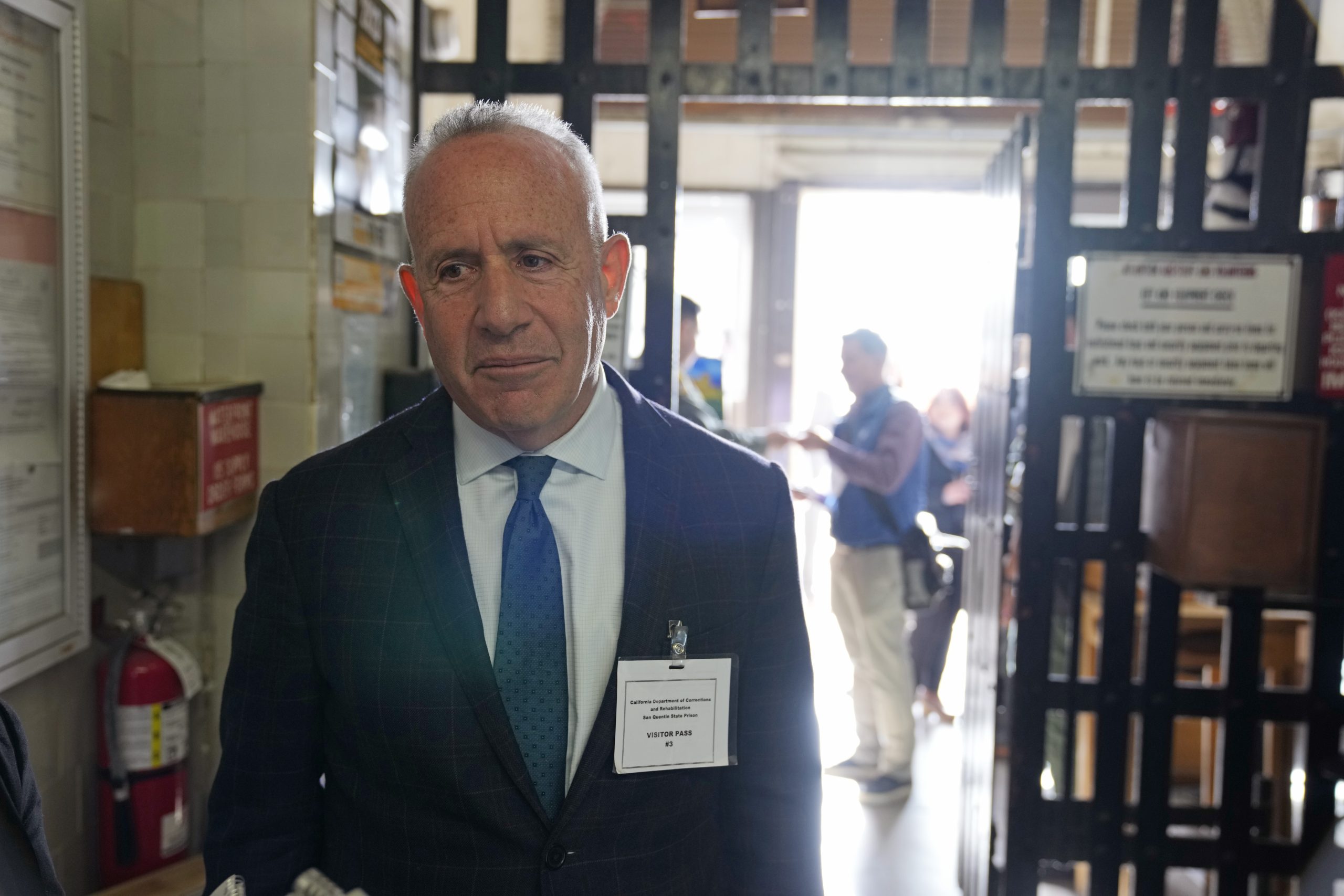 Darrell Steinberg, Sacramento Mayor and the governor's lead advisor for San Quentin State Prison's transformation, talks with reporters during a prison media tour in San Quentin, California, Wednesday, July 26, 2023. In March of 2023, Governor Gavin Newsom announced California intends to transform the prison into the San Quentin Rehabilitation Center. (AP Photo/Eric Risberg)
Prop 66 is changing the conditions and procedures for death penalty cases in California. Contrary to Governor Newsom's claims, people on Death Row will soon face relocation and harder conviction appeals, all while being forced to work for pennies.