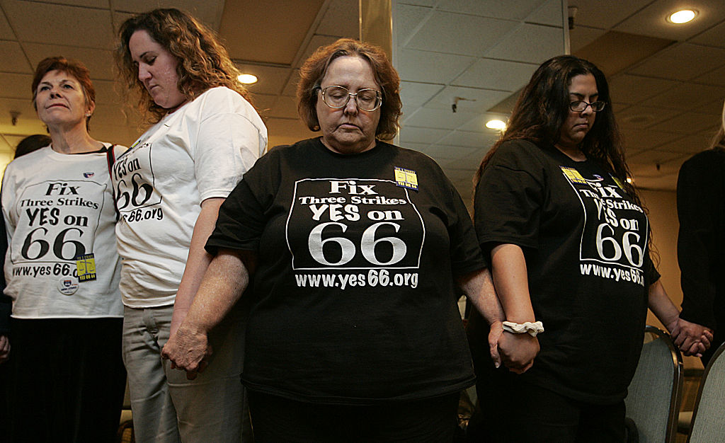 Supporters of Proposition 66 gather for a prayer as the early lead turned into a deficit late in late election returns at the Plaza Hotel in Culver City, California, on Tuesday, November 2, 2004. (Photo by Robert Gauthier/Los Angeles Times via Getty Images)
Prop 66 is changing the conditions and procedures for death penalty cases in California. Contrary to Governor Newsom's claims, people on Death Row will soon face relocation and harder conviction appeals, all while being forced to work for pennies.