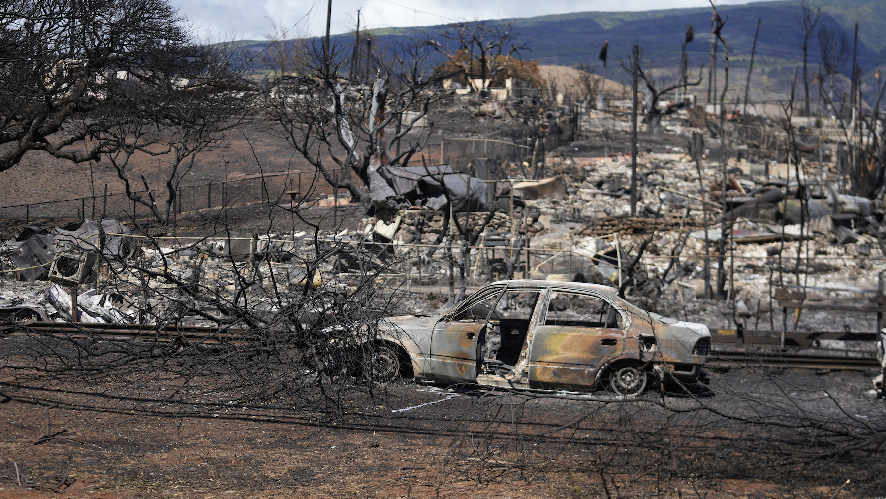 Destroyed property is seen, Sunday, Aug. 13, 2023, in Lahaina, Hawaii, following a deadly wildfire that caused heavy damage days earlier. (AP Photo/Rick Bowmer)
Insufficient government response to the Maui wildfires follows a pattern of state abandonment forged in the aftermath of Hurricane Katrina.