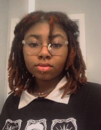 Marrow Woods (they/them) is a queer and disabled writer and organizer based on the traditional homelands of the Mvskoke and Hitchiti peoples, now known as Macon, GA. Woods is a 3rd-year English and Religion, Philosophy, and Social Change BA student at Wesleyan College. Their work and practice centers communal dreaming (especially for queer, trans, and disabled futures), community care, and critical narrative shift frameworks born from tales crafted from viscera and bone.