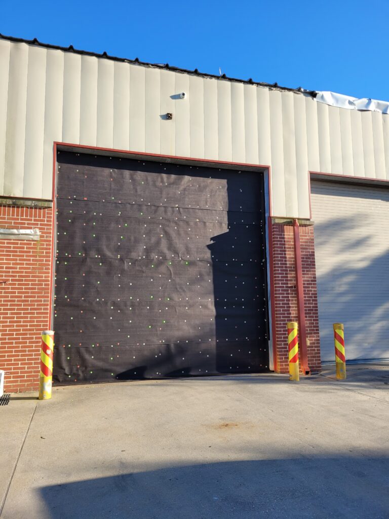 Debris swept around by Ida winds wiped out the door of Little Caillou Admin Station 2, located at 5016 Highway-56 in Chauvin. The department initially covered up the gash with this roll-up door.